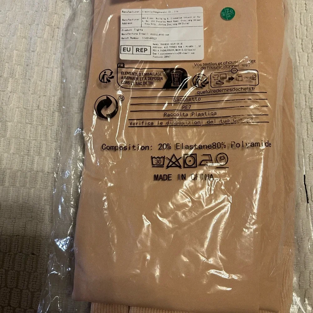 Source‎ Unknown Tan tights